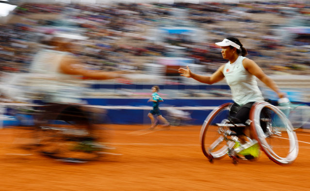 Zhu Zhenzhen and Li Xiaohui of China take on their compatriots Guo Luoyao and Wang Ziying in the women’s doubles at Roland Garros on September 5, 2024. (Photo by Gonzalo Fuentes/Reuters)