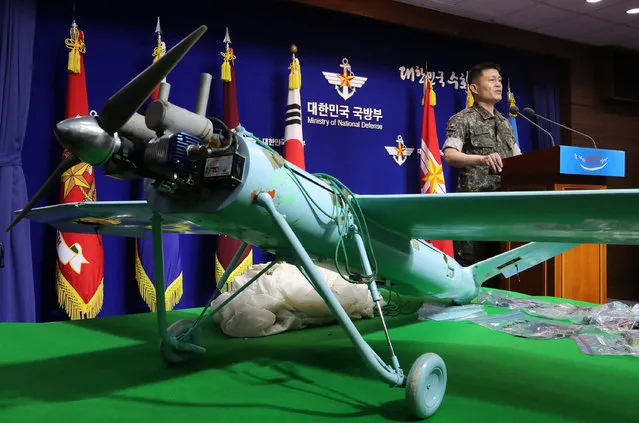 A small aircraft, which South Korea's Military says is a drone from North Korea, is seen at the Defense Ministry in Seoul, South Korea, June 21, 2017. (Photo by Lee Jung-hoon/Reuters/Yonhap)