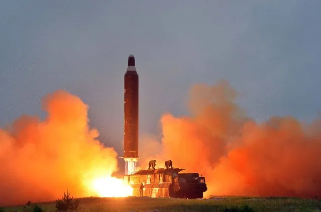 This undated picture released from North Korea's official Korean Central News Agency (KCNA) on June 23, 2016 shows a test launch of the surface-to-surface medium long-range strategic ballistic missile Hwasong-10 at an undisclosed location in North Korea. The Musudan – also known as the Hwasong-10 – has a theoretical range of anywhere between 2,500 and 4,000 kilometres (1,550 to 2,500 miles). (Photo by AFP Photo/KCNA)