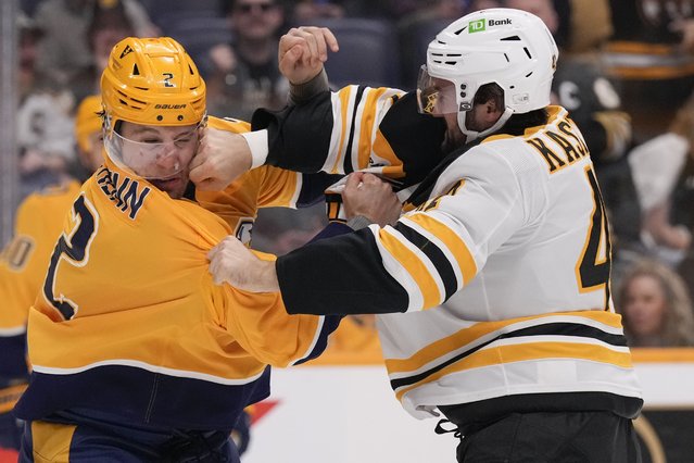 Nashville Predators defenseman Luke Schenn (2) fights with Boston Bruins center Mark Kastelic (47) during the first period of an NHL hockey game Tuesday, October 22, 2024, in Nashville, Tenn. (Photo by George Walker IV/AP Photo)