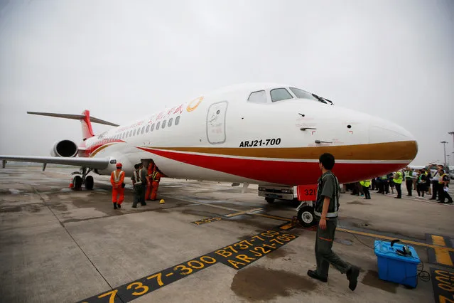 An ARJ21-700, China's first domestically produced regional jet, arrives at Shanghai Hongqiao Airport after making its first flight from Chengdu to Shanghai, China June 28, 2016. (Photo by Aly Song/Reuters)