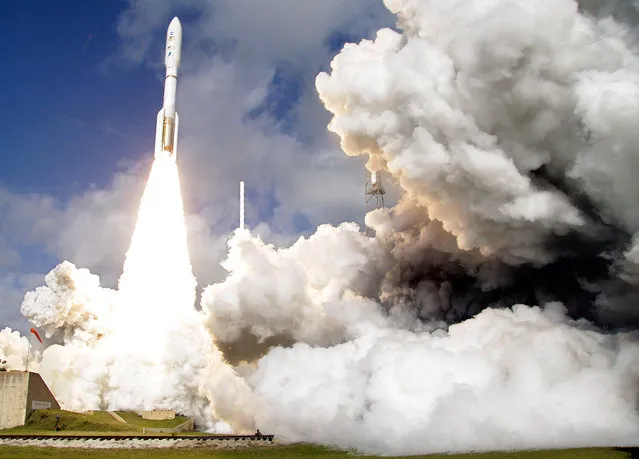 A United Launch Alliance Atlas V rocket carrying NASA's Mars Science Laboratory (MSL) Curiosity rover lifts off from Launch Complex 41at Cape Canaveral Air Force Station in Cape Canaveral, Florida, on November 26, 2011. (Photo by Terry Renna/AP Photo)