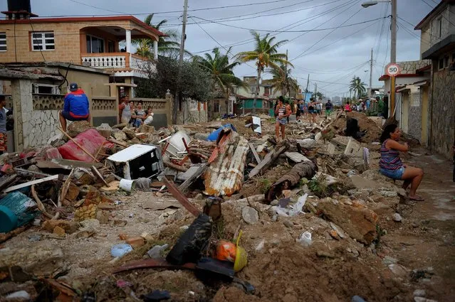 View of damages after the passage of Hurricane Irma, in Cojimar neighborhood in Havana, on September 10, 2017. Residents of Cuba's historic capital Havana were waist-deep in floodwaters after Hurricane Irma, on its way to Florida, swept by, cutting off power and forcing the evacuation of more than a million people. (Photo by Yamil Lage/AFP Photo)