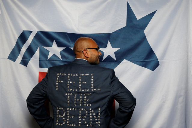 Florida delegate Sanjay Patel poses for a photograph at the Democratic National Convention in Philadelphia, Pennsylvania, United States July 26, 2016. Patel's message to the presidential nominee is: “I want you to earn my vote and our political revolution is going to make you earn their (voters) votes too”. (Photo by Jim Young/Reuters)