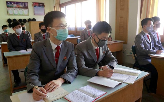 Students wearing face mask attend the class as their university reopened following vacation, at Kim Chaek University of Technology in Pyongyang, Wednesday, April 22, 2020. (Photo by Jon Chol Jin/AP Photo)