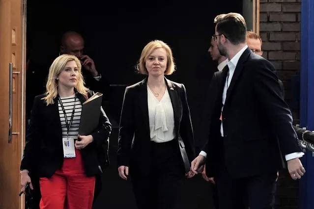 Britain's Prime Minister Liz Truss, centre, arrives for the Conservative Party annual conference at the International Convention Centre in Birmingham, England, Monday, October 3, 2022. (Photo by Aaron Chown/PA Wtre via AP Photo)