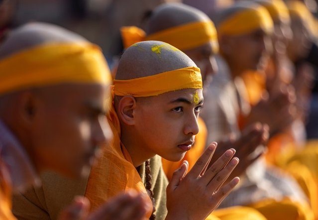 Hindu boys attend Bratabandha, a coming of age ceremony, at the Pashupati temple in Kathmandu, Nepal, 15 January 2025. During the Bratabandha religious ceremony, boys shave their heads, beard and perform rituals for about four to five hours, symbolically meaning they are now mature enough to perform their duties as grown men. Following the ritual, they are each given a janai, or sacred thread, and are henceforth expected to abide by the rules and norms of full-aged men, taking an active part in religious ceremonies, last rites rituals, marriages, etc. (Photo by Narendra Shrestha/EPA/EFE)