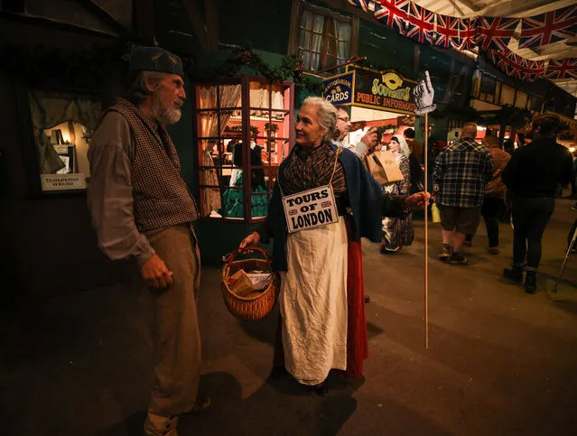 Great Dickens Christmas Fair opens its doors to visitors at the historic Cow Palace in south of San Francisco, in town of Brisbane, California, United States on November 19, 2022. The Great Dickens Christmas Fair is a one-of-a-kind immersive adventure into Victorian London, an elaborate holiday party with hundreds of costumed players performing and interacting with patrons in over 140,000 square feet of theatrically-lit music halls, pubs, dance floors, and festive shops. (Photo by Tayfun Coskun/Anadolu Agency via Getty Images)