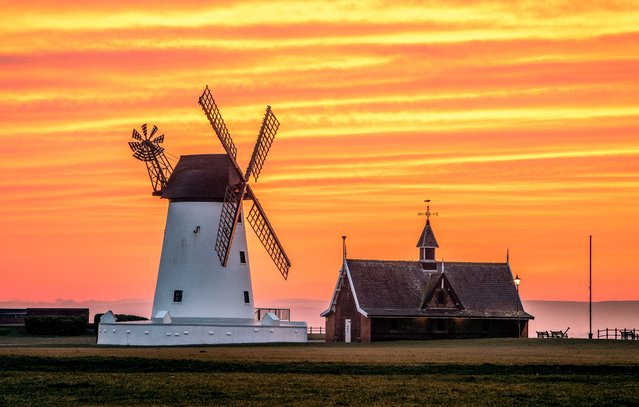 The picture dated March 5, 2025 shows sunrise at Lytham windmill in Lytham St Annes in Lancashire, UK. (Photo by Gregg Wolstenholme/Bav Media)