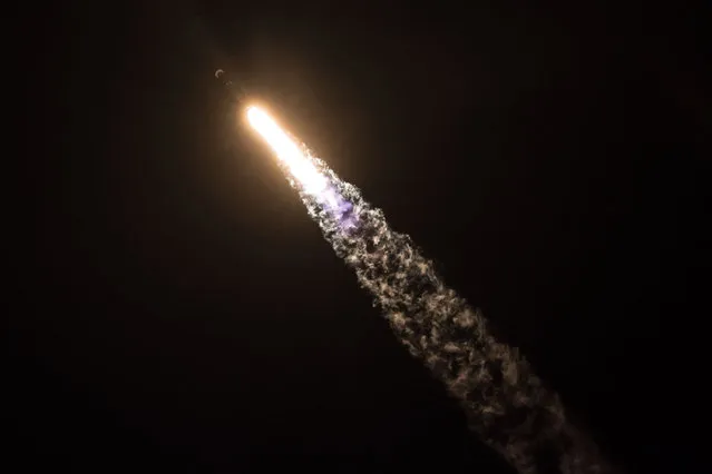 The SpaceX Falcon 9 rocket streaks across the night sky on the secretive Zuma mission from Launch Complex 40 at the Cape Canaveral Air Force Station January 7, 2018 in Cape Canaveral, Florida. The payload was a secret Zuma spacecraft for an un-named U.S. government agency. (Photo by SpaceX)