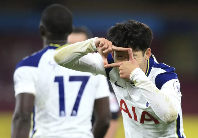 Tottenham's Son Heung-min celebrates after scoring his team's first goal during the English Premier League soccer match between Burnley and Tottenham Hotspur at Turf Moor stadium, Burnley, England, Monday, October 26, 2020. (Photo by Lindsey Parnaby/Pool via AP Photo)