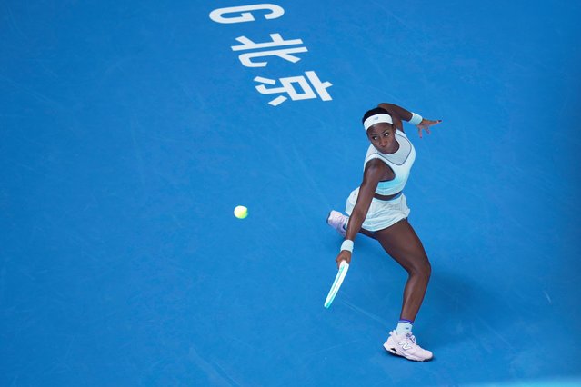 Coco Gauff of the United States plays a backhand return to Leylah Fernandez of Canada during a women's singles match of the China Open tennis tournament, at the National Tennis Center, in Beijing, China, Sunday, September 28, 2025. (Photo by Mahesh Kumar A./AP Photo)