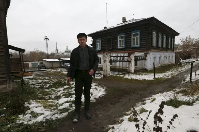 Local resident Sergei poses for a picture on a street in Alapayevsk in Sverdlovsk region, Russia October 15, 2015. (Photo by Maxim Zmeyev/Reuters)