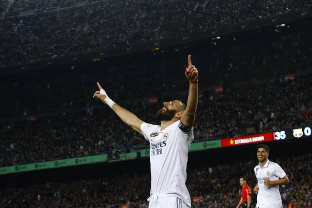 Real Madrid's Karim Benzema celebrates after scoring his side's fourth goal during the Spanish Copa del Rey semifinal, second leg soccer match between Barcelona and Real Madrid at the Camp Nou stadium in Barcelona, Spain, Wednesday, April 5, 2023. (Photo by Joan Monfort/AP Photo)