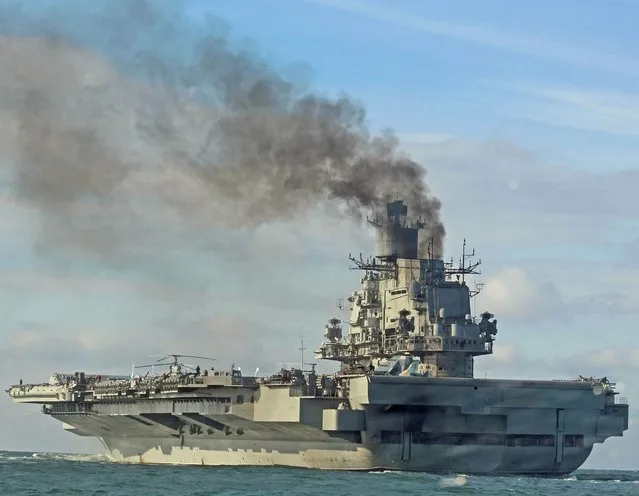 The Russian aircraft carrier Admiral Kuznetsov passes within a few miles of Dover, in the southeast of England as a fleet of Russian warships sail through the North Sea, and the English Channel Friday October 21, 2016. Britain is sending warships to watch a Russian aircraft carrier group and other vessels as they sail through the North Sea and the English Channel. Defense Secretary Michael Fallon said Thursday, that the military will watch “every step of the way”. (Photo by Ferrari Press Agency)