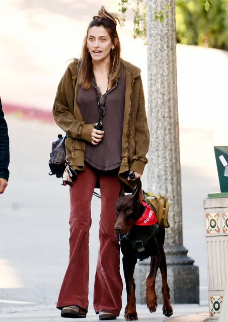 American model Paris Jackson takes her doberman dog for a walk in L.A. after having lunch at Beachwood Cafe in Beachwood Canyon with her dog and a friend on Tuesday, April 4, 2023. Paris just announced her summer tour dates opening for the famous 90s rock band Incubus. (Photo by GAC/The Mega Agency)
