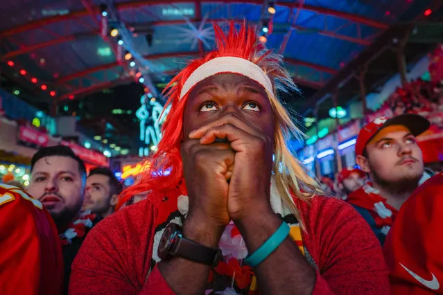 Fans cheer on the Chiefs at the Power and Light District as the Kansas City Chiefs play the San Francisco 49ers in the Super Bowl on February 2, 2020 in Kansas City, Kansas. (Photo by Kyle Rivas/Getty Images)