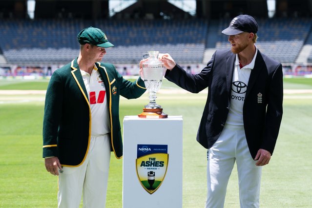 England captain Ben Stokes (right) and Australia Captain Steve Smith (left) hold the Waterford Crystal replica urn during a Captains Media Opportunity at the Optus Stadium, Perth, Australia on Thursday, November 20, 2025. (Photo by Robbie Stephenson/PA Wire)