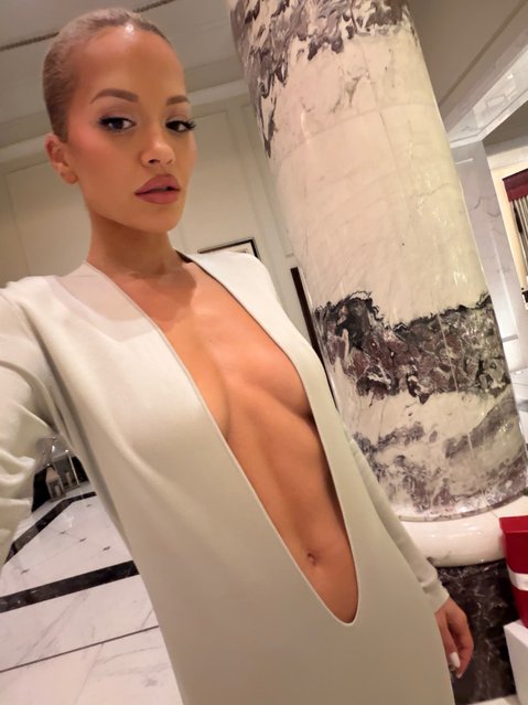 British singer-songwriter Rita Ora wears a plunging dress on December 2, 2025. (Photo by ritaora/Instagram)