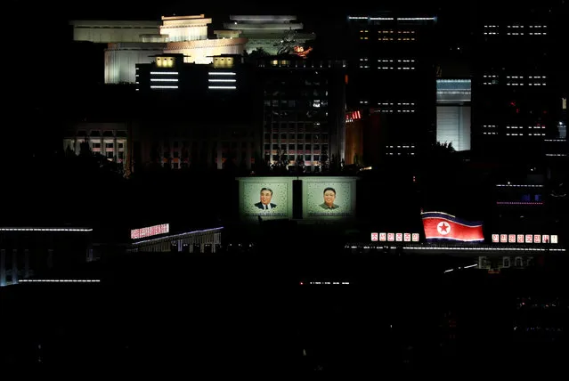 Main Kim Il Sung Square and surrounding buildings are light up on the occasion of 70th anniversary of North Korea's foundation in Pyongyang, North Korea on September 8, 2018. (Photo by Danish Siddiqui/Reuters)