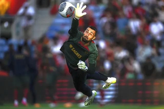 Portugal's goalkeeper #22 Diogo Costa warms up before the start of the EURO 2024 first round group J qualifying football match between Portugal and Luxembourg at the Algarve stadium in Almancil, Faro district, on September 11, 2023. (Photo by Patricia De Melo Moreira/AFP Photo)