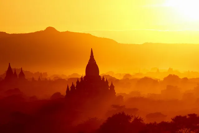“I perched on a terrace of an isolated temple on Bagan, Myanmar, and the scenery in front of me was magical, with the sunset projecting this incredible light”. (Photo by Sylvie Bosse/Guardian Witness)