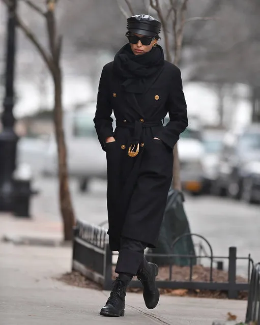 Irina Shayk wears a black coat and hat in New York City on January 19, 2019. (Photo by Robert O'neil/Splash News and Pictures)