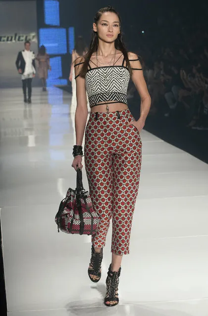 A model wears a creation from the Colcci Summer collection during the Sao Paulo Fashion Week in Sao Paulo, Brazil, Wednesday, April 15, 2015. (Photo by Andre Penner/AP Photo)