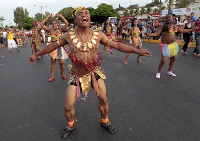 Revelers take part in a parade during an annual carnival called “Alegria por la Vida” (Joy for life) in Managua April 25, 2015. (Photo by Oswaldo Rivas/Reuters)
