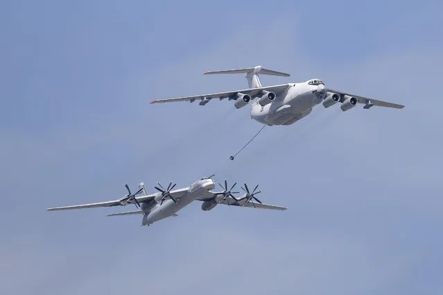 An Ilyushin Il-78 Midas air force tanker and a Tupolev Tu-95MS strategic bomber fly over the Red Square during the Victory Day parade in Moscow, Russia, May 9, 2015. (Photo by Reuters/Host Photo Agency/RIA Novosti)