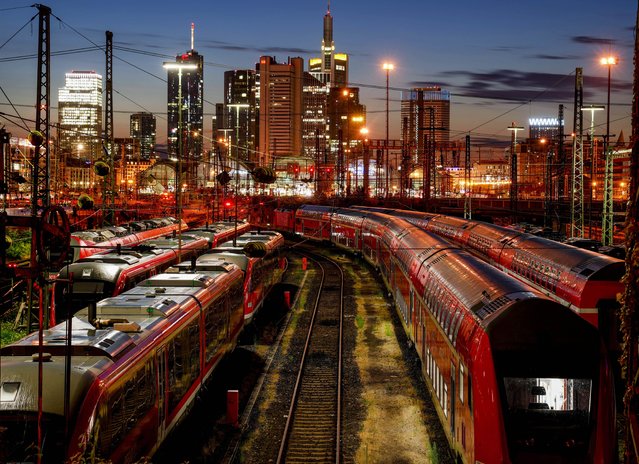 Trains are parked outside the central train station in Frankfurt, Germany, Wednesday, August 11, 2021. Train drivers of the German GDL union asking for higher wages started a strike two hours after midnight. (Photo by Michael Probst/AP Photo)