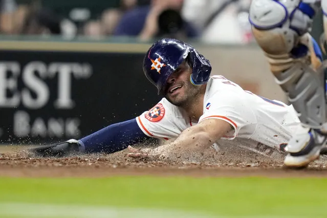 Houston Astros' Jose Altuve scores against the Toronto Blue Jays during the fourth inning of a baseball game Wednesday, April 3, 2024, in Houston. (Photo by Eric Christian Smith/AP Photo)