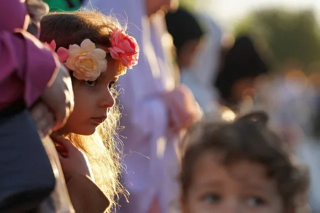 Muslim children attend the Eid al-Fitr prayer, marking the end of Ramadan, in Bucharest, Romania, on April 10, 2024. (Photo by Andreea Campeanu/Reuters)