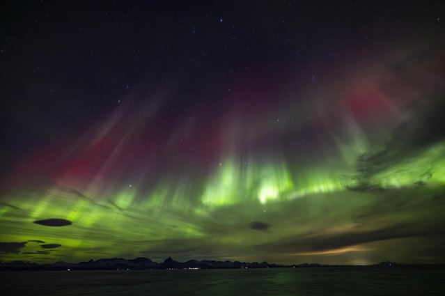 The northern lights put on a magnificent display along the coast of Norway in the last decade of November 2023. (Photo by Richard Lovelock/Solent News)