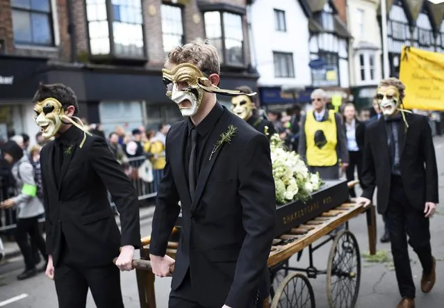 People take part in a procession during celebrations to mark the 400th anniversary of the William Shakespeare's death in the city of his birth, Stratford-Upon-Avon, Britain, April 23, 2016. (Photo by Dylan Martinez/Reuters)