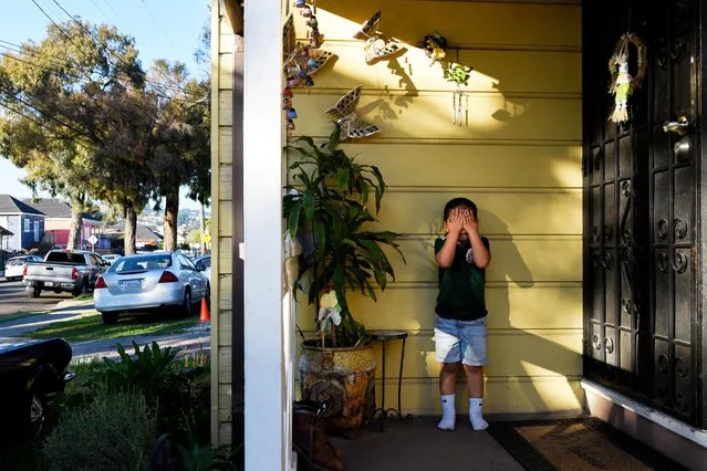 Alexander Avila, 3, who suffers the symptoms of lead poisoning contracted from lead-based paint stands outside his home in Oakland, California, U.S., June 18, 2019. Picture taken June 18, 2019. (Photo by Kate Munsch/Reuters)