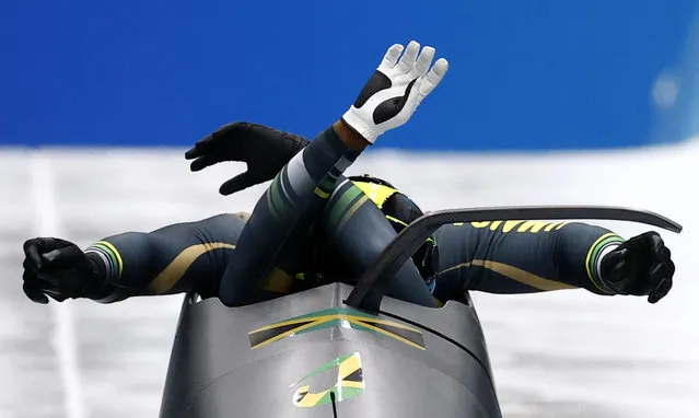 Shanwayne Stephens of Jamaica and Nimroy Turgott of Jamaica in action at National Sliding Centre in Beijing, China on February 14, 2022. (Photo by Thomas Peter/Reuters)