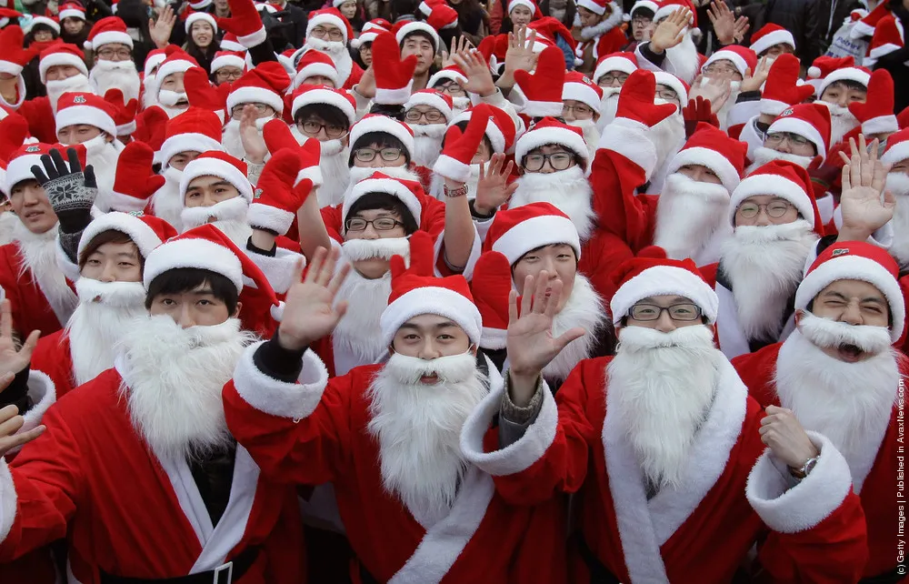 South Koreans Dressed As Santa Hit The Streets Of Seoul