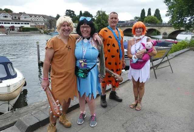 80's music fans turn out in fancy dress and vintage t-shirts celebrating their favourite bands on their way to the Rewind South Festival at Temple Island Meadows in Oxfordshire, United Kingdom on August 22, 2021. (Photo by Geoffrey Swaine/Rex Features/Shutterstock)