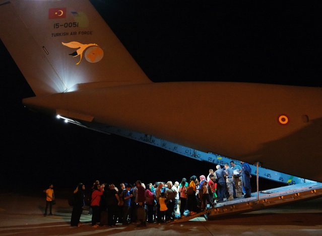 Turkish citizens are being evacuated from Sudan with a military plane A400M belonging to the Turkish Air Force at Wadi Seidna Air Base, due to clashes between the Sudanese army and paramilitary Rapid Support Forces (RSF) since April 15th, in Khartoum, Sudan on April 28, 2023. (Photo by Ali Haydar Akkus/Anadolu Agency via Getty Images)