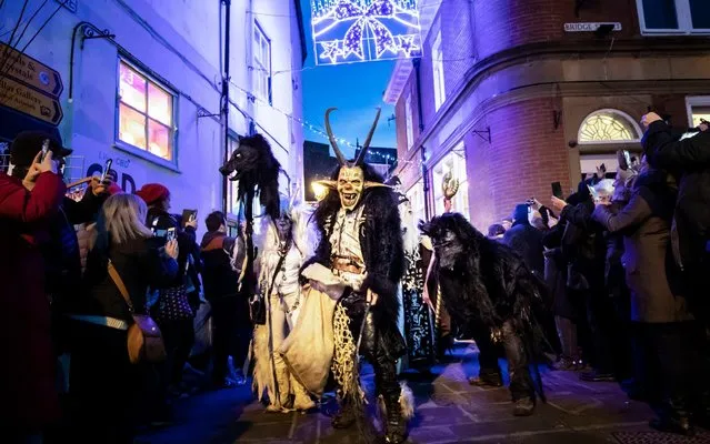 Participants during the Whitby Krampus Run street parade Saturday December 7, 2019, which celebrates the Krampus, a horned creature who accompanies Saint Nicholas on his rounds. The event at Whitby is the very first to celebrate this folklore character in the UK. Picture date: Saturday December 7, 2019. (Photo by Danny Lawson/PA Images via Getty Images)