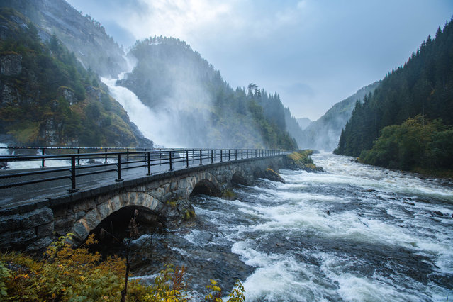 View of the bridge with the Latefossen waterfall in the background. Latefossen waterfall is located in Odda. It is 165-metre and is a well-known tourist attraction in the area. It consists of two separate streams flowing down from the lake Lotevatnet, which join together in the middle. This image was taken in September 2023. (Photo by Børth Aadne Sætrenes/Getty Images)