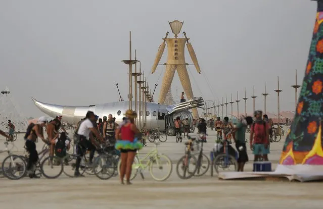A view of the Playa and the Man during the Burning Man 2014 “Caravansary” arts and music festival in the Black Rock Desert of Nevada, August 28, 2014. (Photo by Jim Urquhart/Reuters)