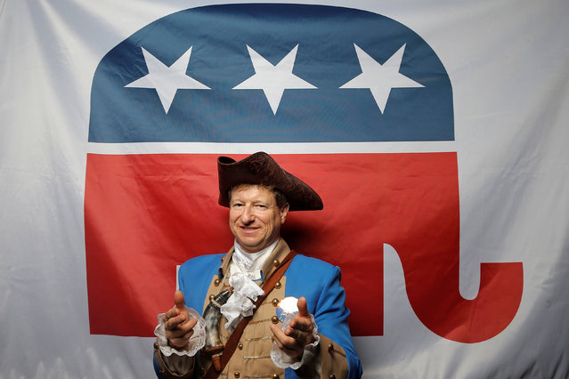 “Arthur the Patriot”, an alternate from Arizona, poses for a photograph at the Republican National Convention in Cleveland, Ohio, United States July 19, 2016. Arthur's message to the presidential nominee is: “The Tea Party supports you”. (Photo by Jim Young/Reuters)