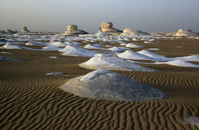 This Saturday, May 19, 2013 file photo shows a view of  the Egyptian White desert, about 500 kilometers (310 miles) southwest of Cairo, Egypt. At least 12 people were killed and 10 injured in Egypt's southwestern desert Sunday, September 13, 2015, when security forces mistakenly fired on a group of Mexican tourists, Egyptian officials said. (Photo by Manoocher Deghati/AP Photo)