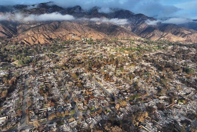 An aerial view shows homes burned in the Eaton Fire on February 05, 2025 in Altadena, California. U.S. President Donald Trump and California Gov. Gavin Newsom had an Oval Office meeting today discussing federal wildfire disaster relief and recovery assistance. More than 12,000 structures, many of them homes and businesses, were destroyed in the Palisades and Eaton Fires, which are now 100 percent contained. (Photo by Mario Tama/Getty Images)