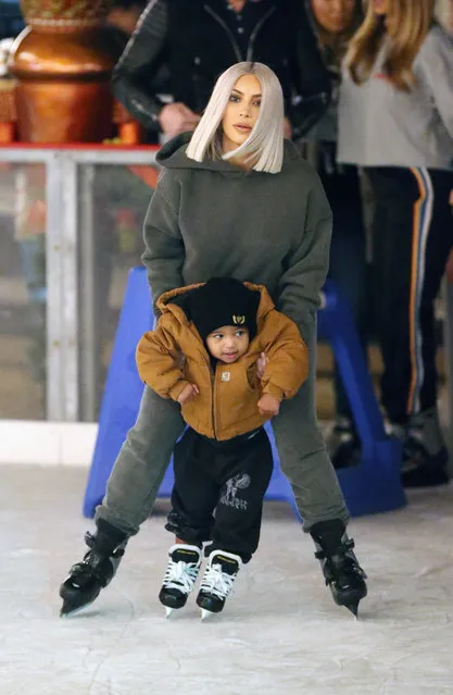Kim Kardashian ice skating with North and son Saint at a Christmas party in Thousand Oaks, Los Angeles on December 23, 2017. (Photo by Brewer/Prahl/Splash News and Pictures)