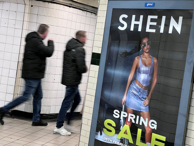 People walk past an advertisement for Shein, in London, Britain, on March 8, 2024. (Photo by Suzanne Plunkett/Reuters)