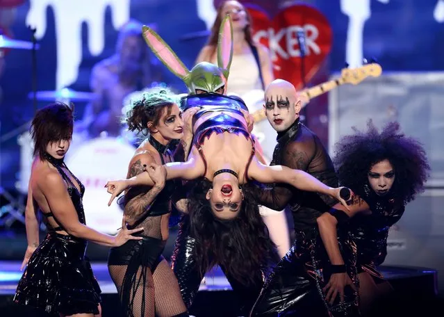 Charli XCX performs on stage at the 42nd annual American Music Awards at Nokia Theatre L.A. Live on Sunday, November 23, 2014, in Los Angeles. (Photo by Matt Sayles/Invision/AP Photo)