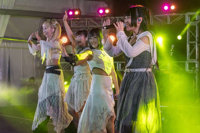 Rika Woo, 31, a Cantonese opera performer and a captain of underground J-pop style idol group Otome Syndream, with her group members Ai, Maho, and Rinka, greet fans during a performance in Hong Kong, China, on November 1, 2024. (Photo by Tyrone Siu/Reuters)